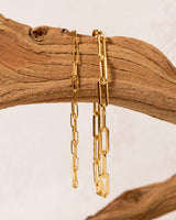 Phoebe 14k gold-filled paperclip bracelets on driftwood, both sizes small- and large-link