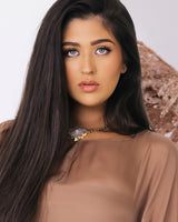 Model wearing Zuri Solar Quartz necklace on 14k gold-filled oval rolo chain