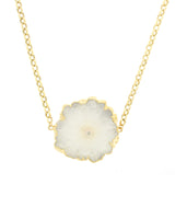 Zuri Solar Quartz necklace hanging on white