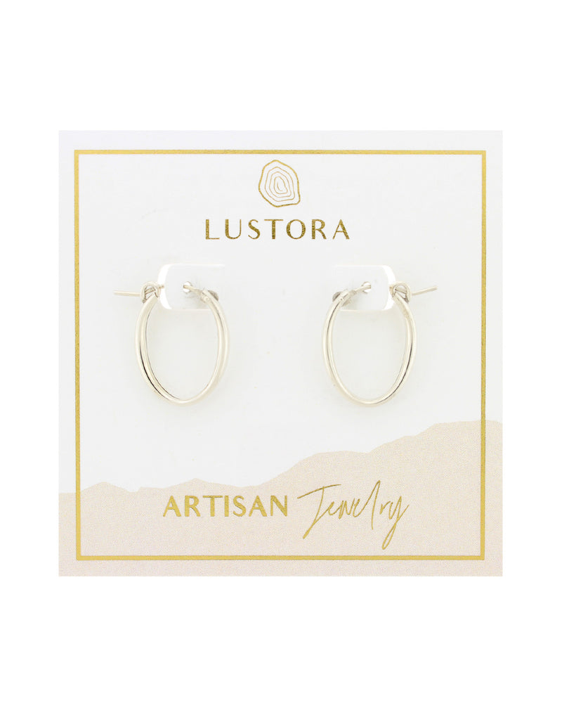 Small Cami Oval Hoop earrings in Sterling silver on Lustora jewelry card