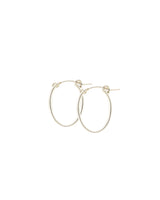 Small Sterling silver Cami Oval Hoops on white background