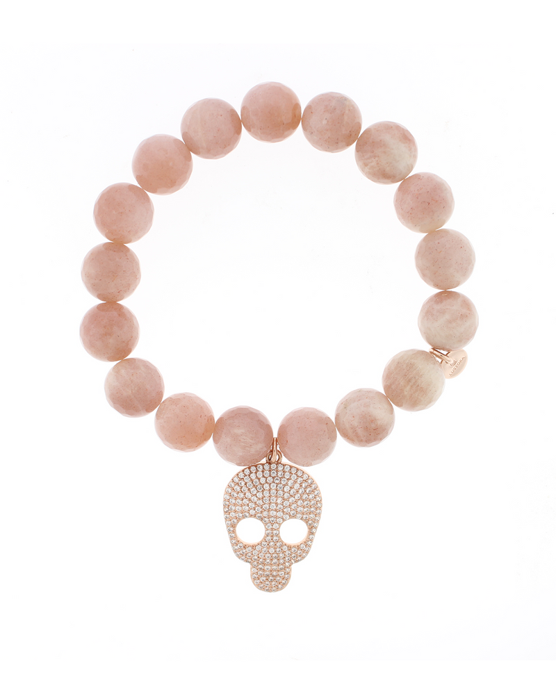 Rose gold-plated skull charm bracelet with faceted pink moonstone beads