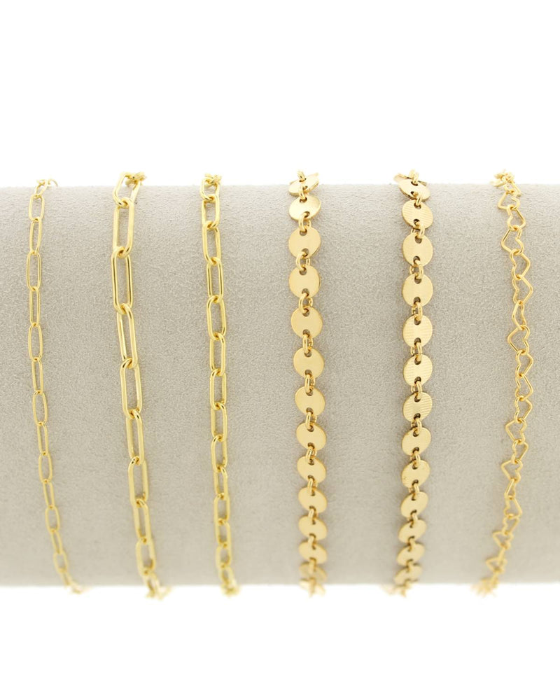 Set of Linked by Lustora™ gold chains for permanent jewelry on a white background