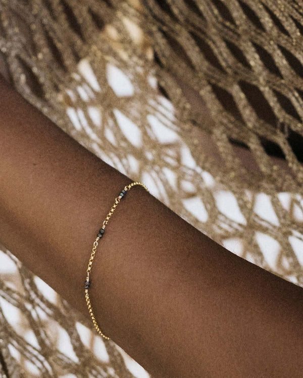 Close Up of a Model Wearing a Trifecta Bracelet
